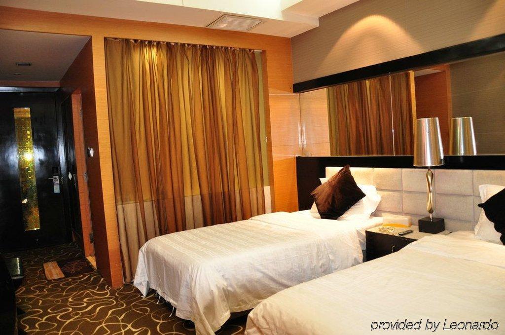 Harbin Yakelai Holiday Hotel الغرفة الصورة