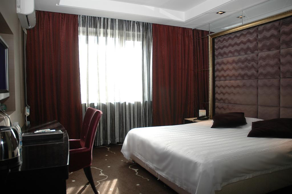 Harbin Yakelai Holiday Hotel الغرفة الصورة