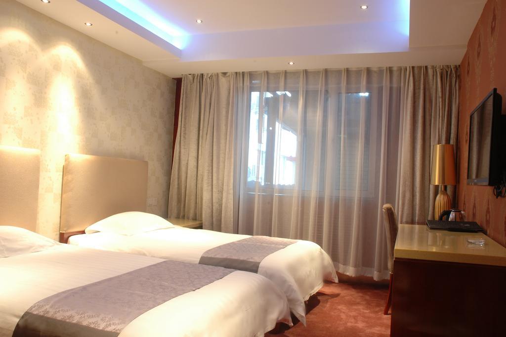 Harbin Yakelai Holiday Hotel الغرفة الصورة