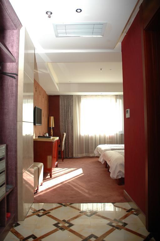 Harbin Yakelai Holiday Hotel الغرفة الصورة