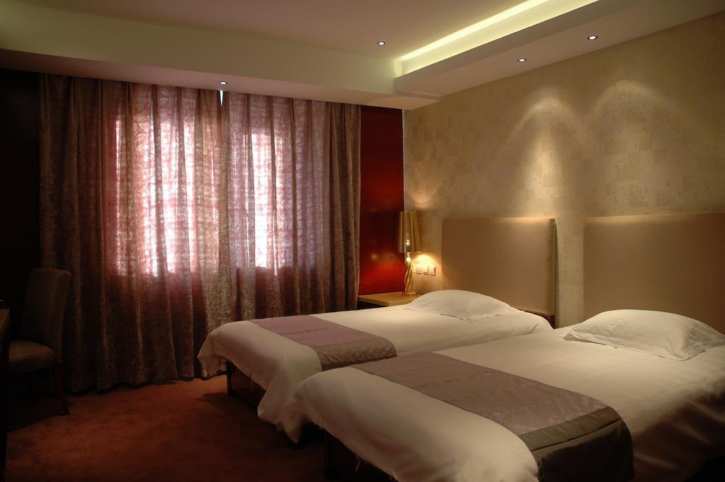 Harbin Yakelai Holiday Hotel الغرفة الصورة