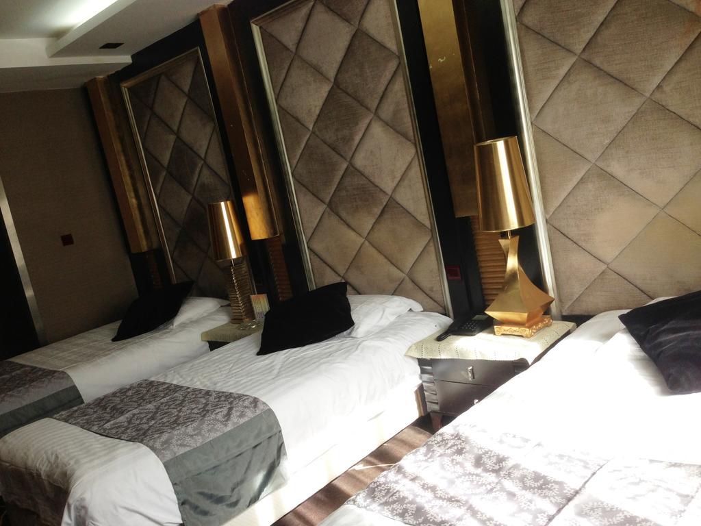 Harbin Yakelai Holiday Hotel الغرفة الصورة