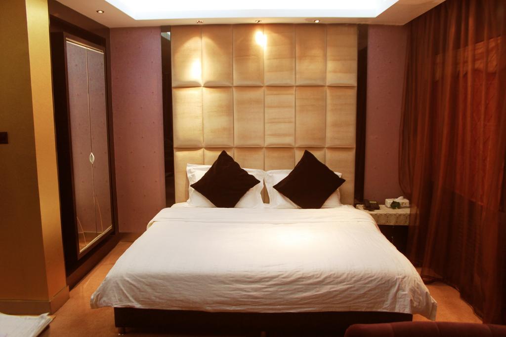 Harbin Yakelai Holiday Hotel الغرفة الصورة