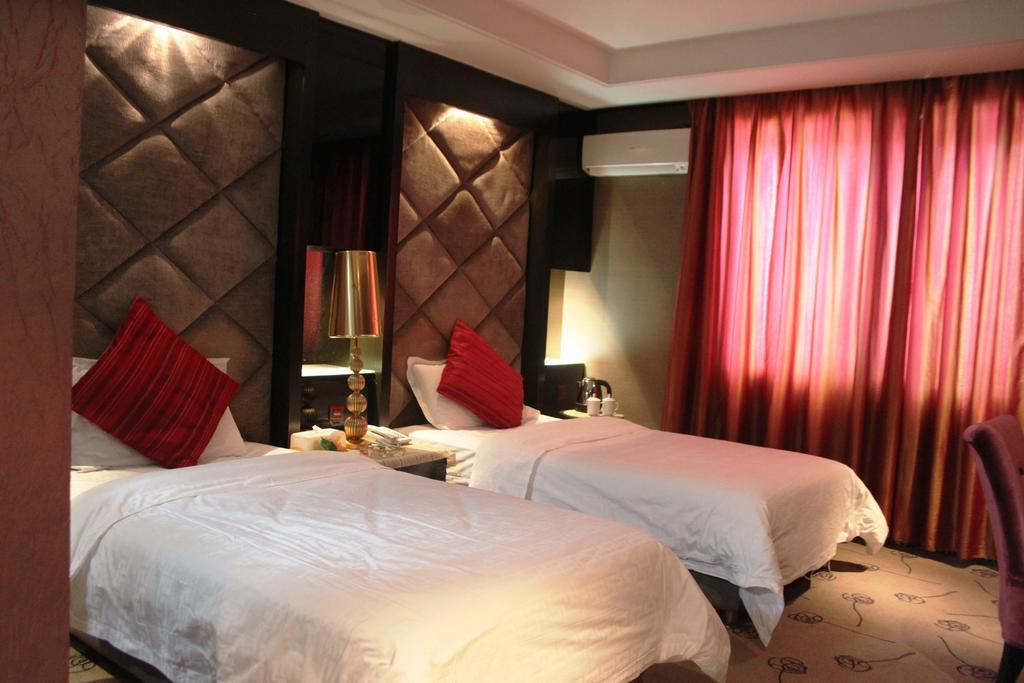 Harbin Yakelai Holiday Hotel الغرفة الصورة